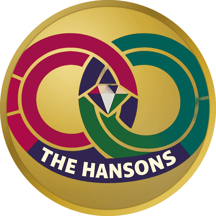 Gold groomsmen coin with two interlocking rings in crimson and deep teal, each broken into thick arcs so the bare polished gold shows through inside them, a faceted pale diamond where they cross, and THE HANSONS in cream capitals on a plum band curving rim to rim
